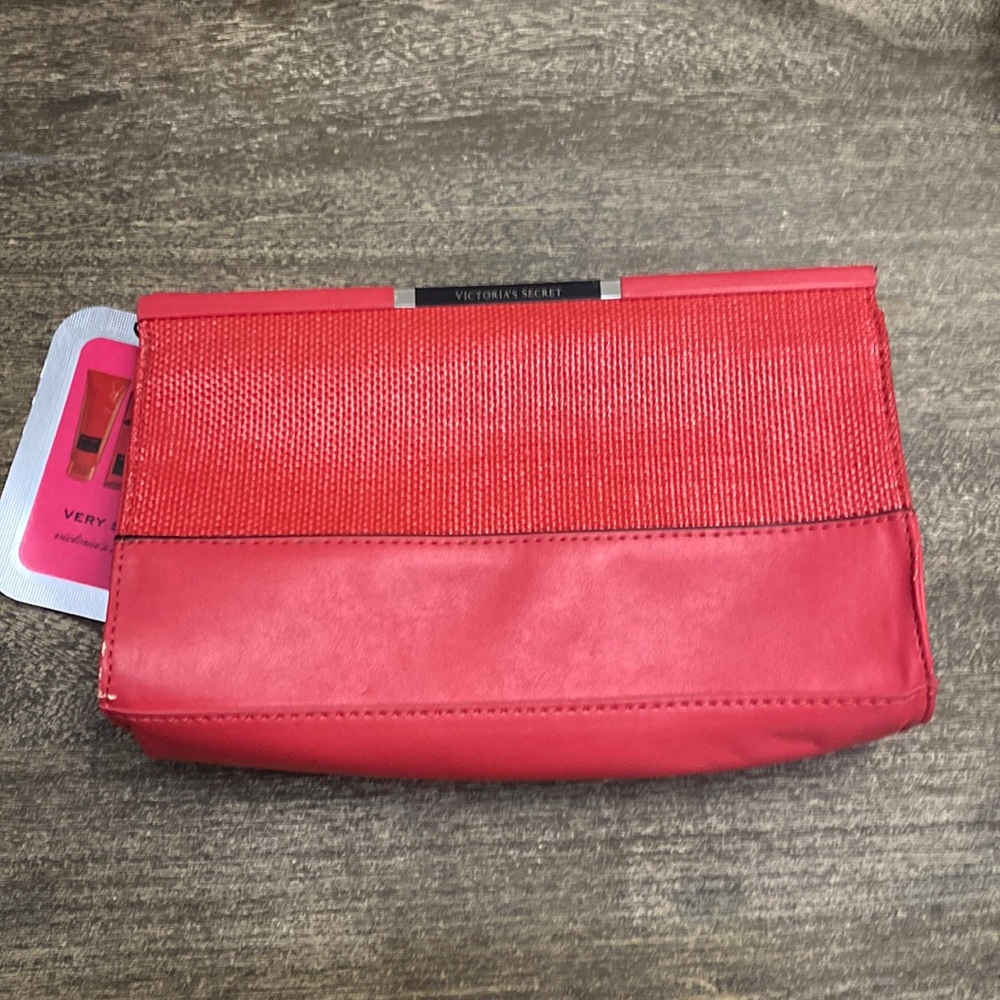 Victoria’s Secret clutch bank with clip to close - Picture 1 of 10